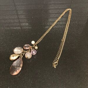 Women’s necklace with multiple jewels pendant